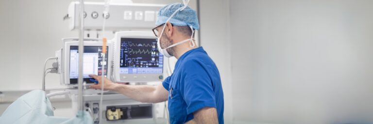 A healthcare technologist conducts a test using specialized equipment